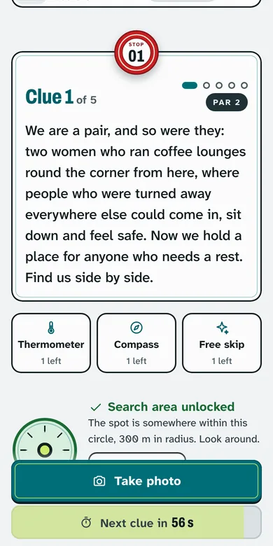 The Competitive stop screen: the Thermometer, Compass and Free skip lifelines, the search area unlocked, a 300 m circle, and the next clue counting down